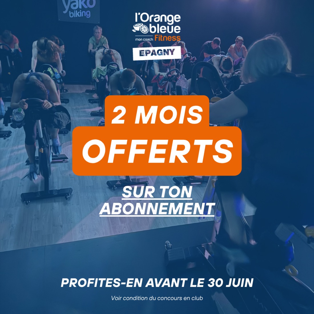 Cours collectif biking, ambiance tamisée